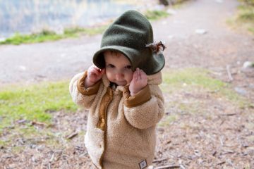 photo of baby wearing jacket