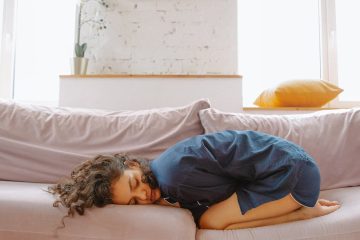 woman suffering from a stomach pain