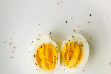 sliced boiled egg on white plate