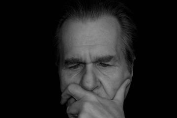 man s face greyscale picture